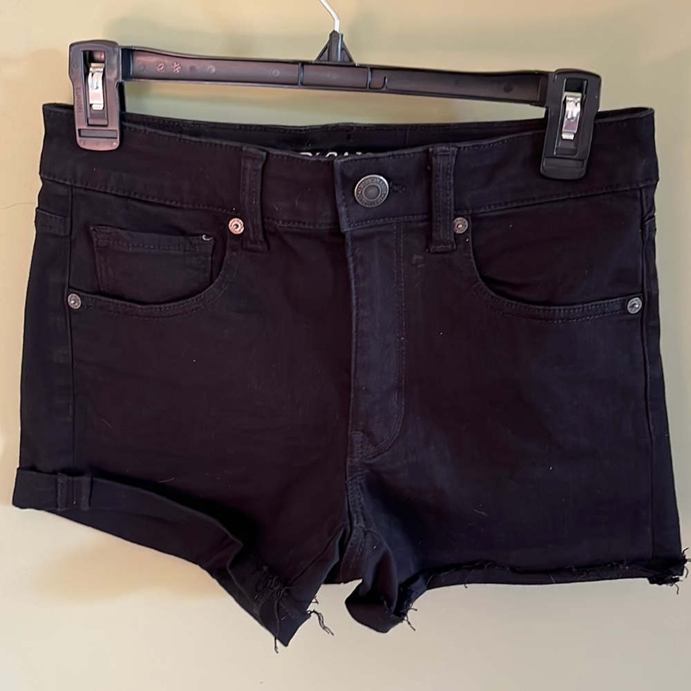 Like NEW American Eagle Ripped Lace Pocket Black Jean Shorts. Size 6.